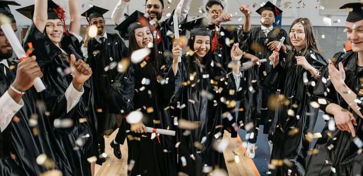 Fresh Graduates Celebrating in Gym